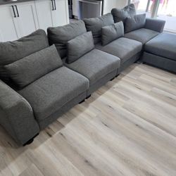 L Shaped Grey Couch. Only 4.months old. Original.price $600