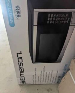 New sealed in box Emerson microwave