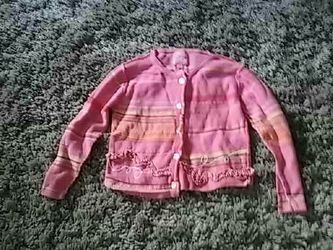 Beautiful sweater size 10 brand new worn once