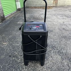 Schumacher SC1309 wheeled battery charger and engine starter