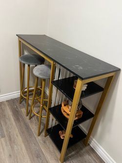 Bar table with matching stools