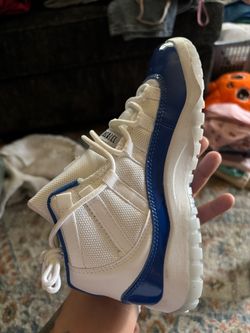 Air Jordan 11 White Blue Patent Sneakers
