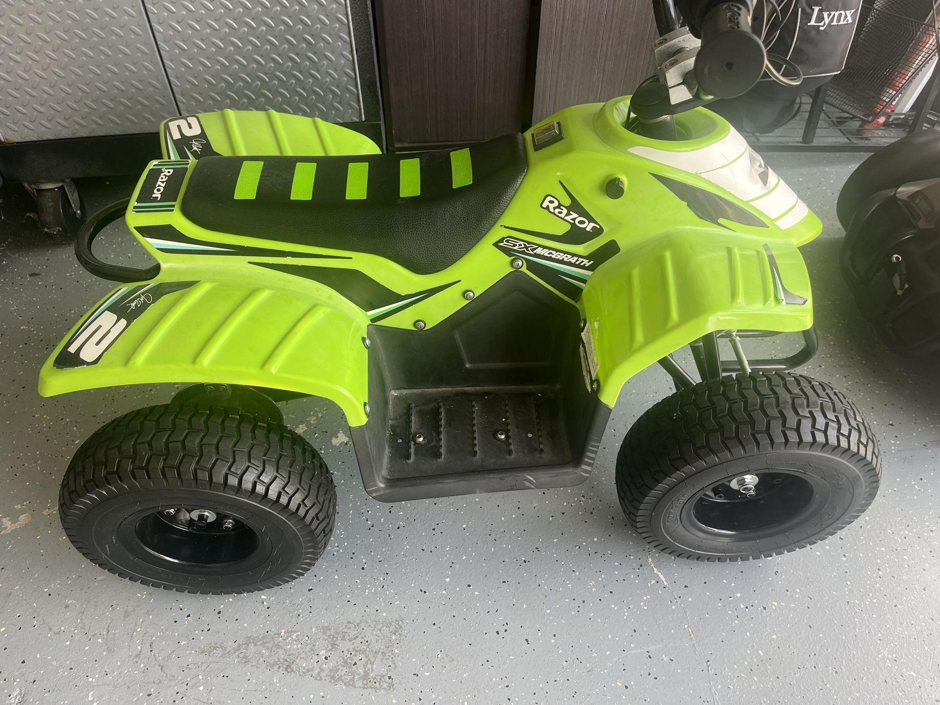 Razor-Dirt Quad-24V-Electric 4-Wheeler ATV. Jeremy McGrath edition.  Good condition.  8-10 mph. Has new battery that needs to be installed. .   $280