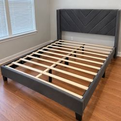 Queen size bed frame (new in the box )