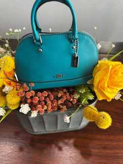 Coach Mini Cora Domed Satchel, likely Style F34090, in Blue/Turquoise crossgrain leather. The shape, crossgrain texture, silver hardware, logo placeme