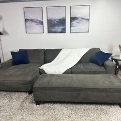 Free delivery Living spaces gray 2-piece sectional couch with storage ottoman 