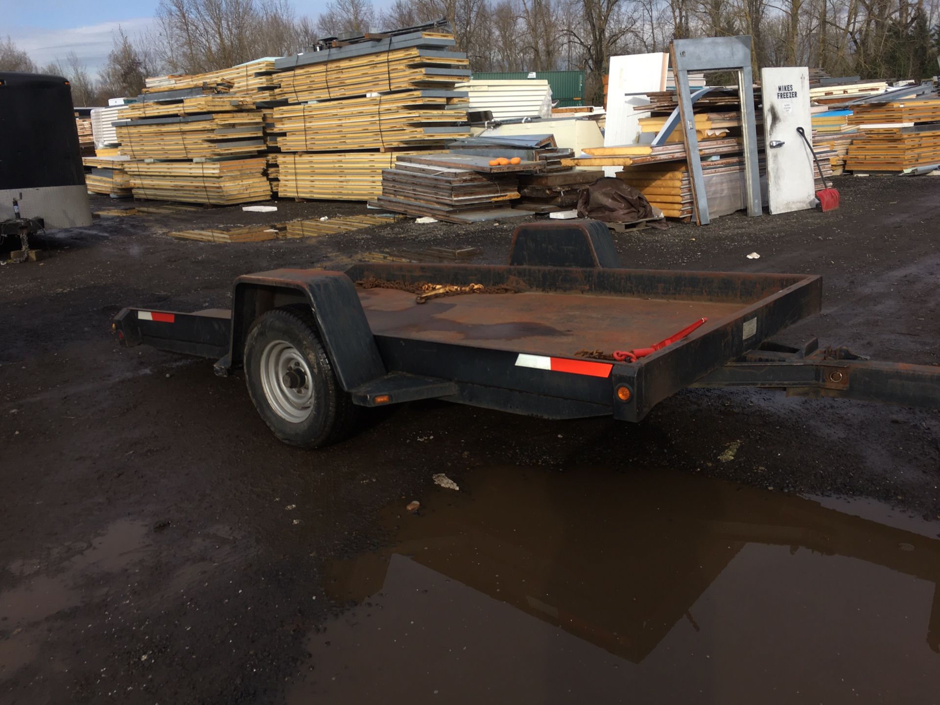 Equipment trailer tilts