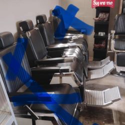 3 Black Barber Chairs. 