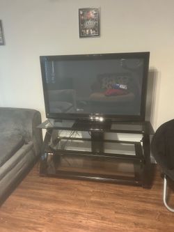 Tv stand and 50in tv