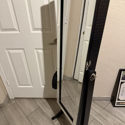 Full length mirror with jewelry storage 