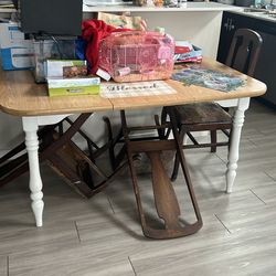 Dining table with leaf at bottom
