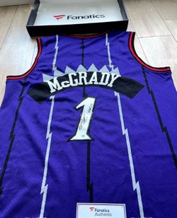 McGrady signed his 1998-99 Raptors jersey