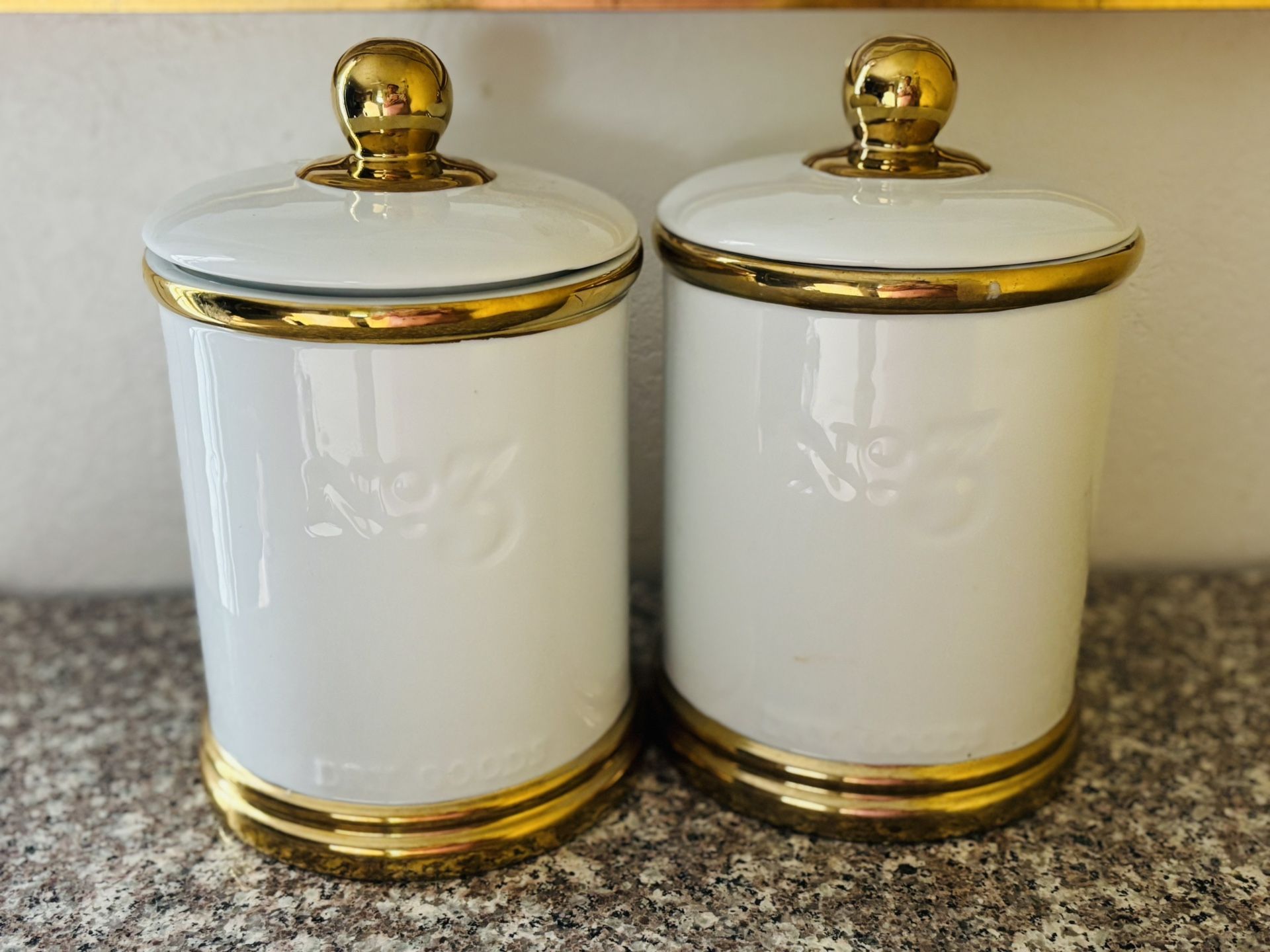 2 Gold And White Canisters