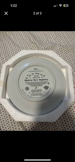 “Up Up Pooh-Ray!” collectible plate.