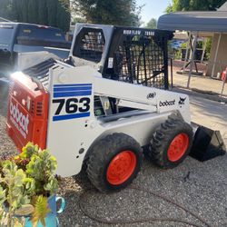 Dump Trailer And Botcat Works 