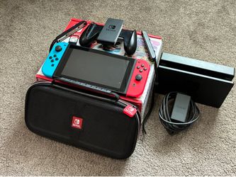 Nintendo Switch + Super Smash Bros + JoyCon, Case and TV Dock
