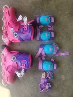 Pink Rollerblades with Knee Pads and Elbow Pads with Gloves