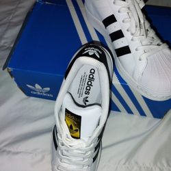 white leather with black stripes Adidas size 8 and 1/2 New in Box