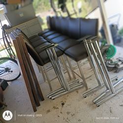 Solid Steel bar stool chairs and three tables