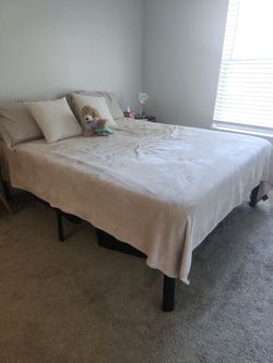 Queen Bed and Mattress. 1 Year Old!!  Excellent Condition!!! Moving Sale