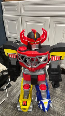 This is a Fisher-Price Imaginext Power Rangers Morphin Megazord, a large 27-to-28-inch robot toy featuring light-up eyes and action pads.