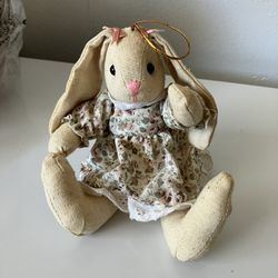 Cute Girl Stuffed Bunny In Print Dress