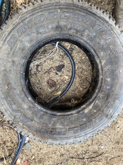 1 used Bridgestone tire 30.5 15 R 15