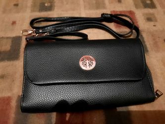 Leather wallet clutch, with adjustable straps 5"x8" like new!