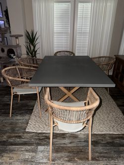 Outdoor gray table with six chairs