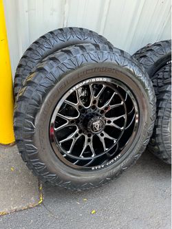 NEW 20x10 axe Offroad wheels wrapped in 35x12.50r20 tires. They are 8 lug 8x180 bolt pattern
