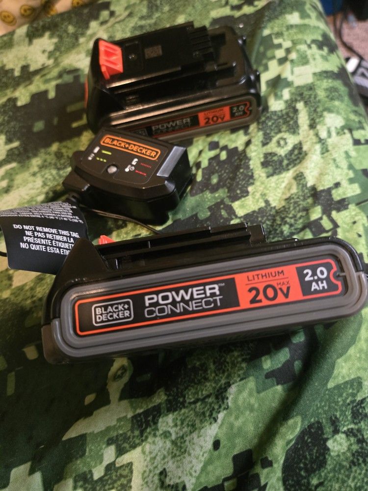 Two Black And Decker 20v Max 2.0AH Batteries Includes Charger