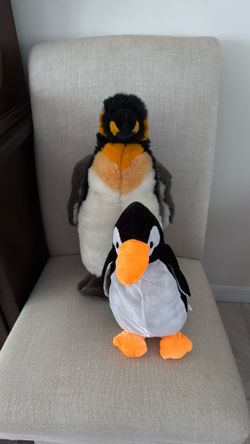 Two stuffed penguins