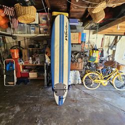 Wavestorm 8ft Foam surfboard with leash, good condition, minimal wear