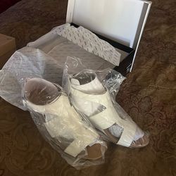 Brand new Alfani, summer platform sandals. White leather, size 11. Purchased at Macy’s for my daughter and they were never worn never opened.