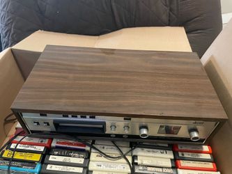 8 track player with tapes