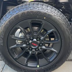 20 inch TRD matte black wheels with 265/60R20 falken all terrain tires