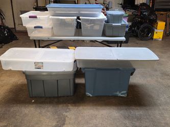 11 storage totes with lids. Multiple sizes