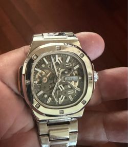 Ice time skeleton automatic watch stainless steel 43mm  men’s watch with genuine diamonds box included,sells for 900 online my asking price 400