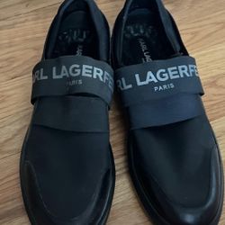 Sleek black Karl Lagerfeld Paris slip-on sneakers