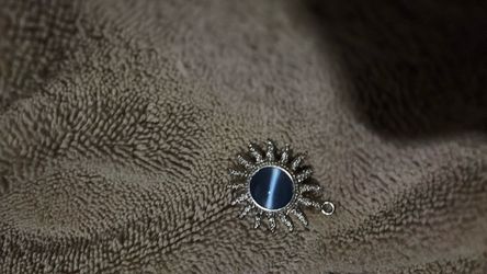 Vintage blue tigers eye silver sunburst star pendant