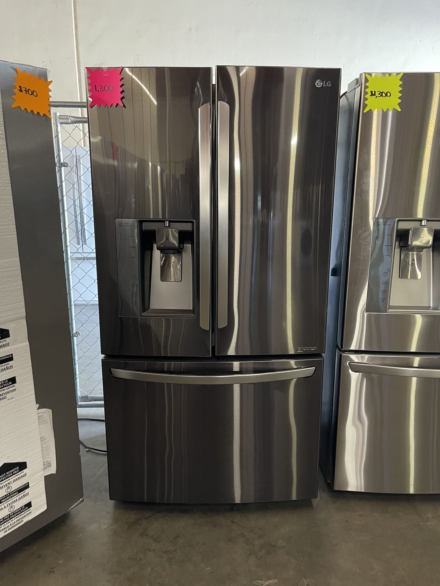 LG three door refrigerator black stainless steek