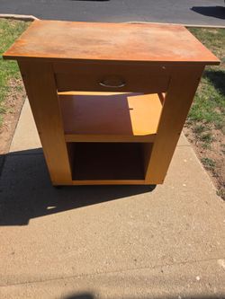 Free! Microwave stand with wheels.