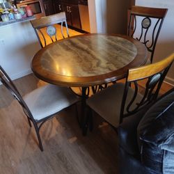 DINETTE SET TABLE AND FOUR CHAIRS 