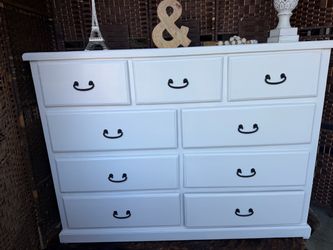 White Dresser all the drawers work good with Black Hardware all the drawers work  good