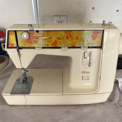1960s Singer Genie Sewing Machine In Very Good Working Condition.