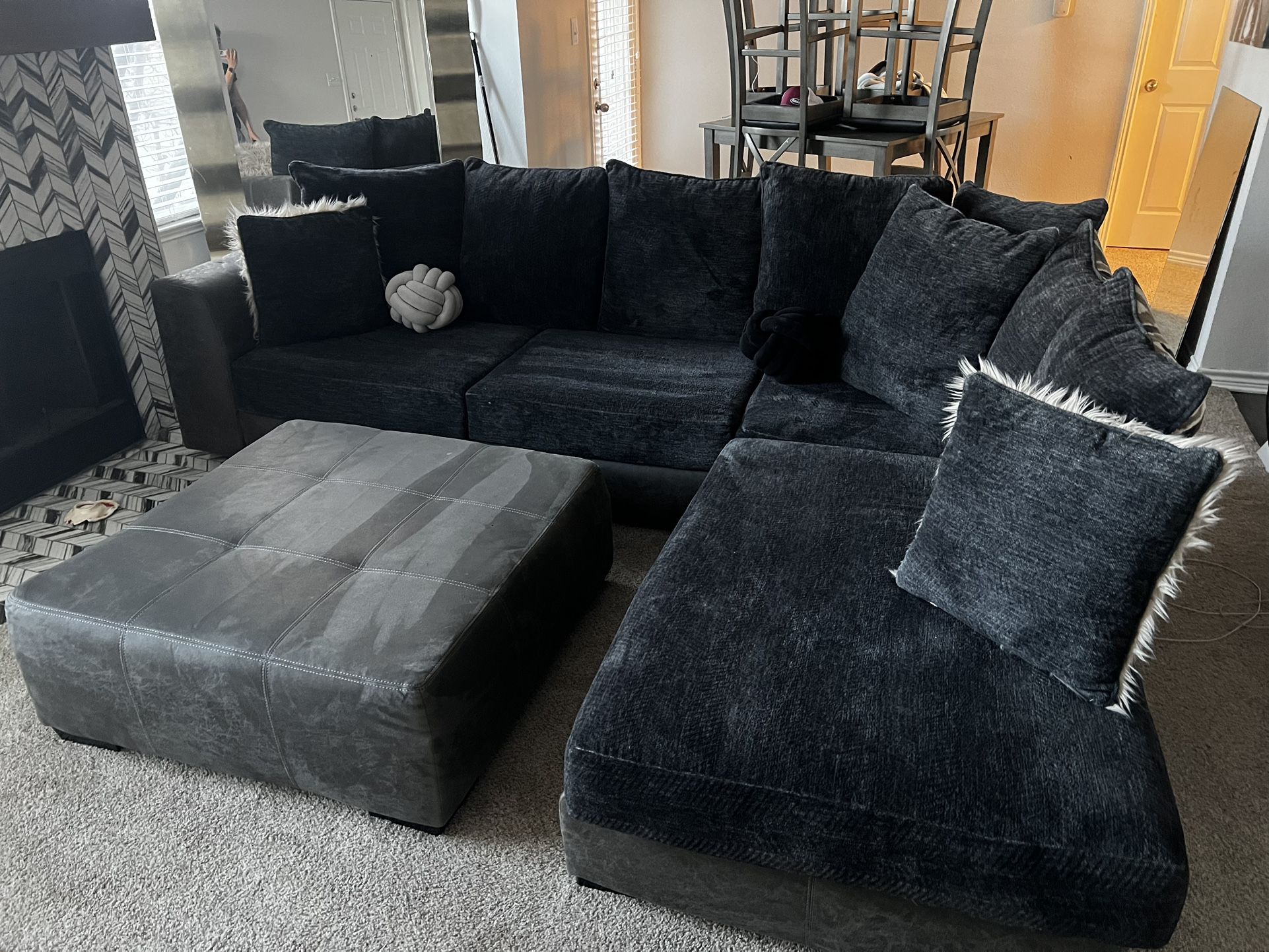 Dark Gray Sectional With Ottoman And Table