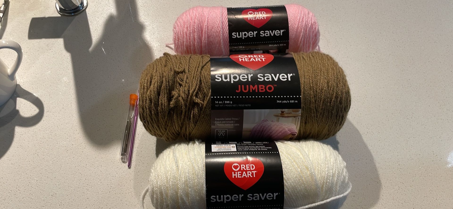 Crochet Items (yarn, hook, needles, stuffing)