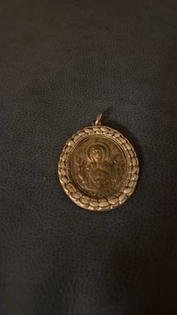 Antique silver Catholic  possibly Polish 1800’s icon of the Virgin adorned with scotch color amber and 4 angels in the back very rare item