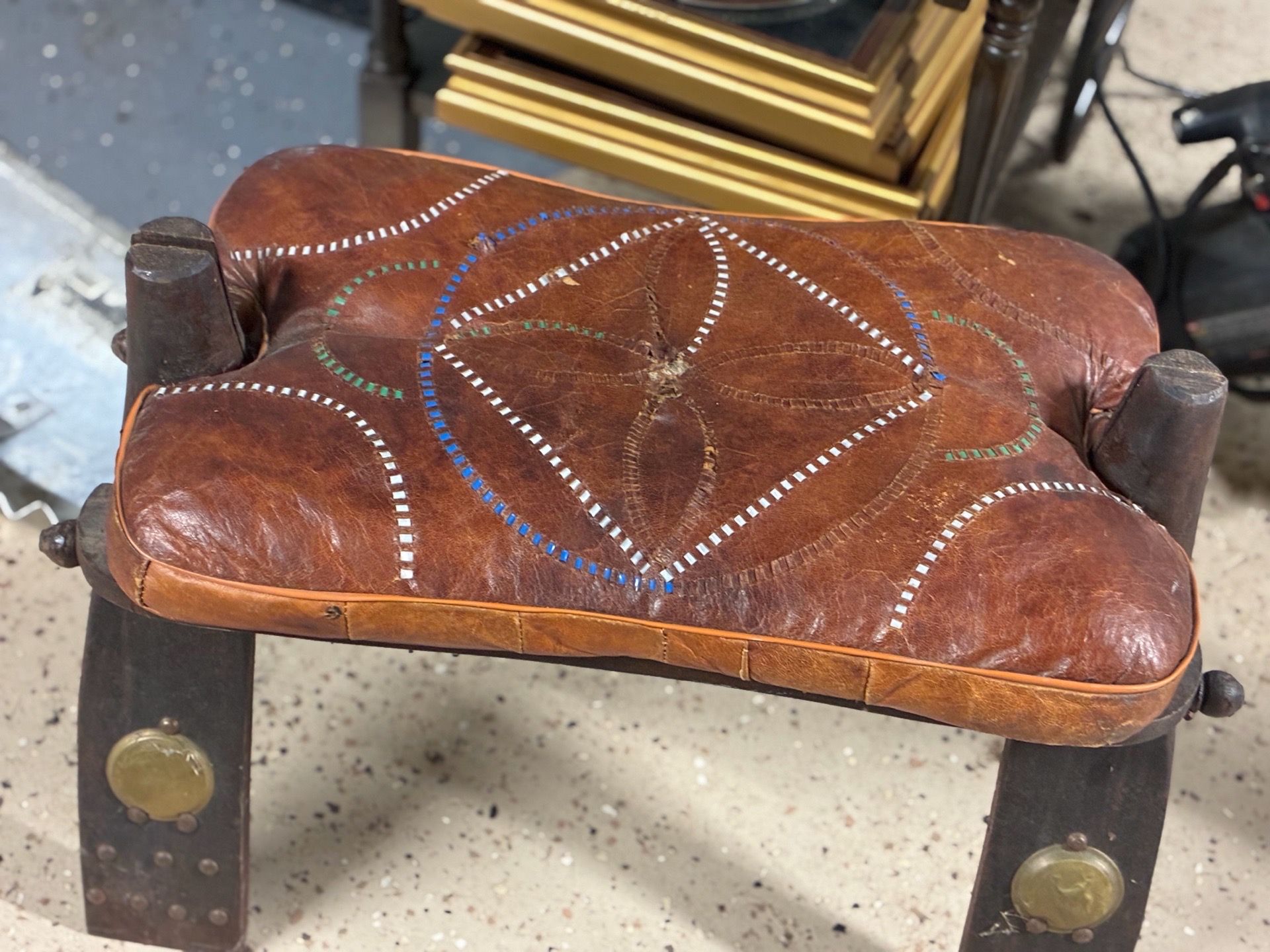 Folding leather stool