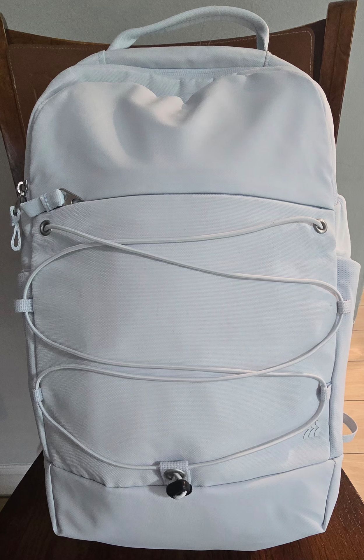all in motion. Light Grey Backpack